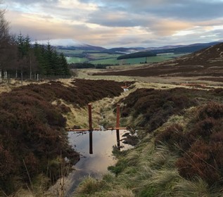 Timber dams designed to slow the flow, store runoff and replenish groundwater storage