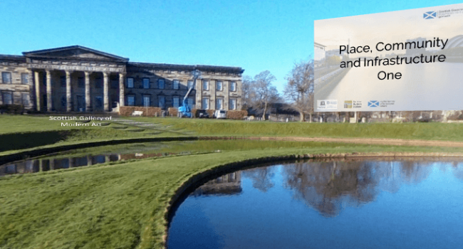 Museum entrance with grass and lake